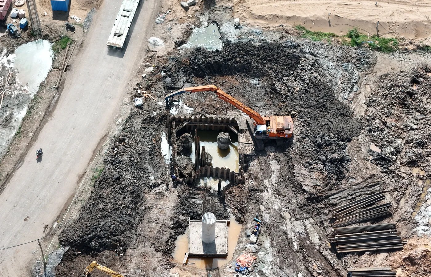 Aerial view of an excavator working in a complex excavation area